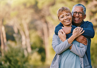 Image showing Nature, love and portrait of a senior couple hugging in a garden while on romantic outdoor date. Happy, smile and elderly people in retirement embracing in park while on a walk for fresh air together