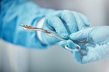 Image showing Team work, surgery or hands with a scissors in hospital for an operation procedure working or helping. Trust, medical people or healthcare doctors in emergency room with safety gloves or job tools