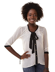 Image showing Portrait, fashion and afro with a black woman in studio isolated on a white background while standing hand on hip. Model, style and african with an attractive young female in contemporary clothes