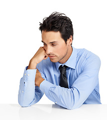 Image showing Thinking businessman, sad or stress on studio background desk of financial mistake, bankruptcy anxiety or money laundering. Mental health, burnout or depression for corporate worker at mockup table