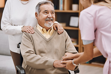 Image showing Disability patient holding hands with doctor for senior help, support and trust home nursing, physical therapy and healthcare. Medical worker consulting elderly man in wheelchair in caregiver welcome