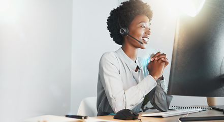 Image showing Call center, black woman and smile with headphones, office and customer service for consulting help at job. Woman, crm expert and customer support by computer, focus and telemarketing work in Atlanta