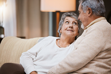 Image showing Love, sofa and senior couple talking, marriage and bonding for relationship, retirement and romance. Romantic, elderly man and mature woman in living room, conversation and relax on weekend break.