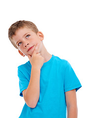 Image showing Planning, decision and boy thinking with wonder, fantasy and young person isolated on white studio background. Male child, small kid or mindset with day dreaming, creative or goal on studio backdrop