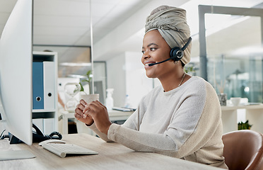 Image showing Crm, contact us or black woman in call center at customer services for a communication or telemarketing agency. Computer, microphone or African consultant talking, helping or speaking at office desk