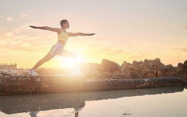 Image showing Beach, yoga or woman stretching in fitness training, body workout or exercise for natural balance in Miami, Florida. Mindfulness, breathing or healthy zen girl exercising at sunset with calm peace