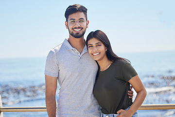 Image showing Love, ocean portrait and couple hug, relax and enjoy outdoor quality time together for peace, freedom and romantic date. Beach, sea and man and woman bond on travel holiday in Rio de Janeiro Brazil