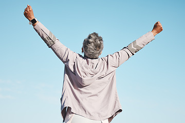 Image showing Freedom, fitness and woman hands in air on blue sky mockup for exercise, fitness or workout training goals, success and achievement. Winner, wow and healthy senior or runner rear in nature wellness