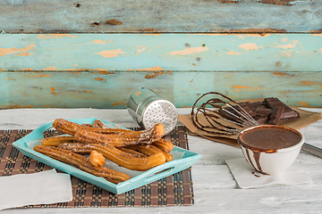 Image showing Traditional churros with hot chocolate 