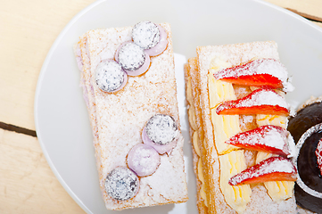 Image showing selection of fresh cream cake dessert plate