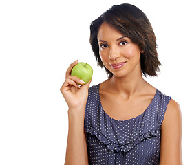 Image showing Woman, studio portrait and apple for diet, lifestyle or low cholesterol with organic snack, health and white background. Black woman, face or green fruit for nutrition, energy or wellness by backdrop