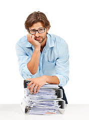 Image showing Burnout, stress and businessman with stack of paperwork on desk for deadline, corporate project and report. Ideas, vision and tired employee thinking with pile of files, review papers and documents