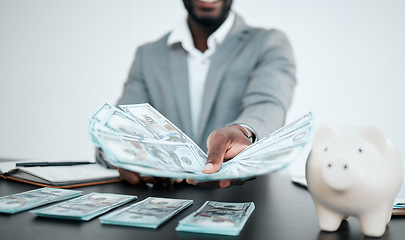 Image showing Hand, dollars and businessman with money for bribe in office. Finance, currency and black man offering cash for financial investment, payment or banking, deal or savings, loan or money laundering.