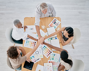 Image showing Team work, hands or creative business people in a meeting planning a logo, branding or marketing color on paper. Designers, top view or employees working with senior manager on strategy or kpi goals