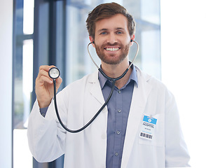 Image showing Cardiology doctor and portrait of man at hospital with expert stethoscope for medical evaluation. Healthcare, cardiologist and professional worker with equipment for heart health consulting.