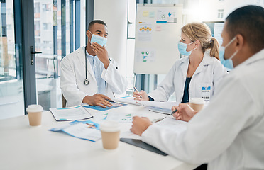 Image showing Medical, covid and chart with doctors in meeting for planning, strategy and teamwork. Medicine, documents and review with healthcare workers in workshop for learning, global and vaccine future