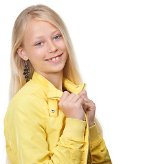 Image showing Happy, smile and portrait of a girl child in a studio with a trendy, cool and stylish teenager outfit. Beauty, happiness and face of a beautiful young kid model by white background with mockup space.