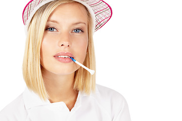 Image showing Portrait, golf and mockup with a sports woman biting a tee in studio isolated on a white background. Face, game and sportswear with a female golfer posing on blank space for advertising or marketing