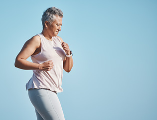 Image showing Fitness, running and senior woman in nature for health, wellness and exercise in Puerto Rico. Sports, runner and elderly female athlete doing an outdoor cardio workout training for a marathon or race