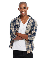 Image showing Portrait, fashion and bald with a black man arms crossed in studio standing on a white background in casual clothes. Face, happy and smile with a handsome young male posing in contemporary clothing