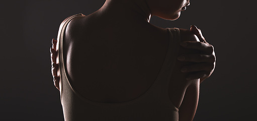 Image showing Woman, body and beauty with dark silhouette and mysterious aesthetic against black studio background. Skincare, cosmetic care and sensual sexy woman back view with cosmetics treatment mockup