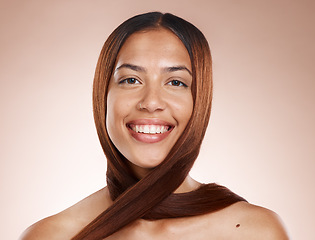 Image showing Woman, happy portrait and hair care glow, skincare beauty and cosmetics spa dermatology on brown background studio. Model smile, luxury facial care and keratin hair shine or healthy hair confidence