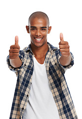 Image showing Portrait, thumbs up and motivation with a black man in studio on a white background saying yes or thank you. Winner, face and success with a handsome young male posing for a deal or agreement