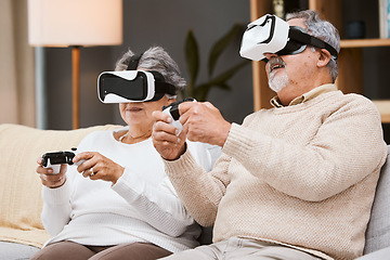 Image showing Virtual reality, gaming and senior couple on sofa in living room having fun. Vr gamer, metaverse and retired elderly man and woman playing futuristic, 3d and ai games with controller while relaxing.