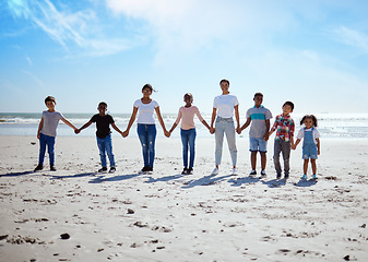 Image showing Beach, holding hands and lesbian women with children for support, holiday diversity and big family love in Indonesia. Trust, hope and portrait of parents with kids for a travel vacation at the sea