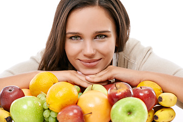 Image showing Woman, fruit and happy portrait for nutrition, breakfast health and diet wellness motivation in white background. Model smile, face and healthy organic fruits, food isolated on table and nutritionist