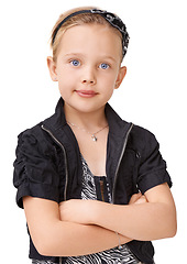 Image showing Arms crossed, confident and portrait of a girl with style on a white background in studio. Stylish, fashionable and child fashion model with pride, confidence and happiness on a studio background