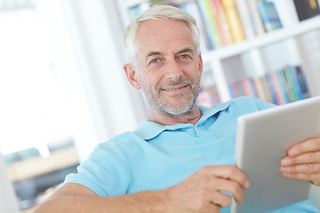 Image showing Tablet, portrait or relax senior man doing internet, web or online website search while happy in home living room. Online shopping, digital tech or elderly person typing, check or scroll on ui screen