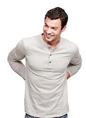 Image showing Thinking, happy and smile with a man in studio isolated on a white background for branding or product placement. Idea, brand and logo with a handsome young male posing on blank marketing space