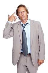 Image showing Businessman, gun hand and head in studio with stress, annoyed and tired by white background. Senior corporate executive, isolated and comic hand sign while frustrated, overworked and anxious from job