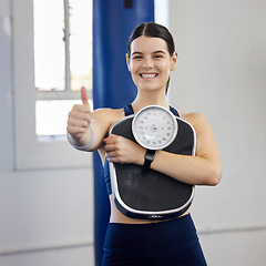 Image showing Woman, gym portrait and thumbs up with scale, wellness and weight loss goal for health, body or fitness. Girl, healthy and workout to lose weight, exercise or focus on anatomy, self care or happiness