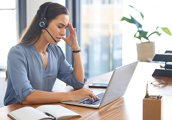 Image showing Call center, stress and tired woman working on laptop with headache, burnout and depression consulting at CRM desk. Female with anxiety mental health problem at customer service telemarketing office