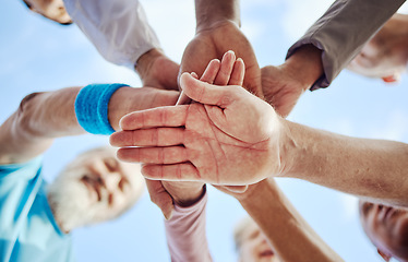 Image showing Fitness, partnership or hands of senior friends with support, hope of faith in strategy, vision or mission for body goals. Low angle, healthy men and elderly people in team building or collaboration