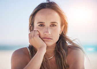 Image showing Sad, thinking and depression with portrait woman at beach feeling stress, exhausted and problems. Mental health, crisis and anxiety with face of girl alone with frustrated, worry and confused at sea