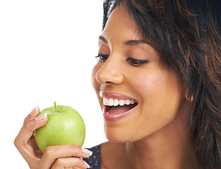 Image showing Black woman, studio and apple with diet, lifestyle and hungry for healthy, organic snack and eating by white background. Woman, smile and natural green fruit for detox, energy or wellness by backdrop