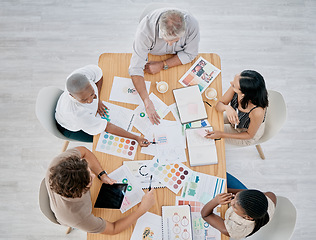 Image showing Team work, hands or creative business people in a meeting planning a logo, branding or marketing color on paper. Designers, top view or employees working with senior manager on strategy or kpi goals