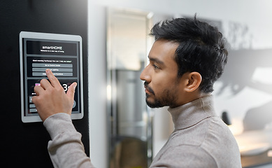 Image showing Smart home wall system, technology and man with digital screen interface for room lighting, house automation or air conditioning. AI software app, control panel and profile of person with IOT monitor