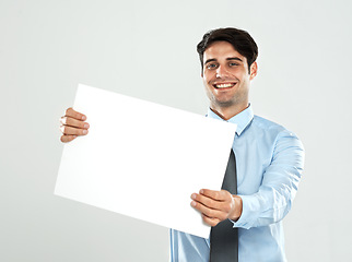 Image showing Poster mockup, presentation and portrait businessman with marketing placard, advertising banner or product placement. Studio mock up, billboard sign and happy sales model isolated on white background