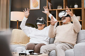 Image showing Gaming, virtual reality and senior couple with headset play online game with VR, technology and smile. Future, elderly woman and happy man in home watching futuristic augmented reality video on sofa.