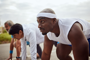 Image showing Runner, fitness or black man ready to start running exercise, cardio workout or sports exercise. Focus, wellness or healthy African male athlete thinking of mission target, vision or running goals