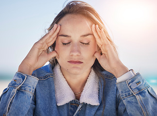 Image showing Thinking woman, stress face or anxiety by beach, ocean environment or sea nature in healthcare wellness meditation. Mental health, mind burnout or depression person with psychology crisis or headache