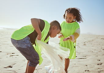 Image showing Plastic bag, beach and children recycling for earth day, planet or community education, learning or volunteering support in nonprofit. Recycle, environment and family kids with teamwork for pollution