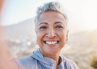 Image showing Elderly woman runner, training selfie and smile in nature for retirement fitness, wellness or self care. Happy senior black woman, park portrait and running by mountains, outdoor and summer workout