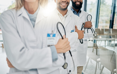 Image showing Healthcare, team and hands of doctors with stethoscope for trust, support and insurance in hospital. Teamwork, leadership and group of medical workers with tools for medicine, wellness and cardiology