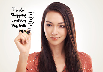 Image showing Virtual to do list, writing and woman planning daily chores, tick box and working on time management. Check mark, pen and model girl with agenda checklist, checkbox and isolated on studio background