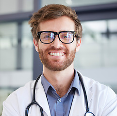 Image showing Medical, smile and glasses with portrait of doctor for consulting, medicine and surgery in hospital. Healthcare, wellness and vision with face of man in clinic for cardiology, innovation and goals